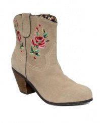 Hop along with these charmingly styled Yodell booties by Betsey Johnson. With a classic cowgirl look, the floral embroidery lends vintage appeal to the rugged stacked heel.