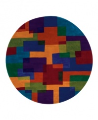 This round rug is ideal for open spaces. A dynamic mix of bright colors and geometric shapes creates an arresting rug that recalls the best of modern art. The color palette of blue, red, salmon, yellow and sage gives the piece a vibrant, buoyant style that lends your home a striking, contemporary look.
