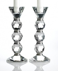 Towers of faceted crystal balls and polished metal rings, the Afterglow candle holders cast modern decor in a glamorous new light. A dazzling gift for brides!