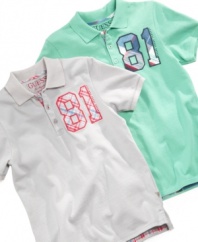 Spruce up his normal polo style with these brightly colored shirts with colorful applique details from guess.