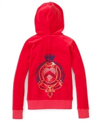Add a fashion-conscious kick to comfort with a classic hoodie from Juicy featuring a sparkling rhinestone logo detail and the JC signature crown.