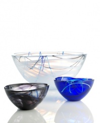 Electric strokes of aquamarine are expertly suspended in this brilliant glass bowl. A one-of-a-kind, handmade creation that adds pop to any room. Designed by Anna Ehrner for Kosta Boda.