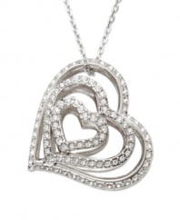 See things in black and white. This exquisitely crafted Swarovski pendant features an elaborate heart motif. One side is embellished in jet crystal pavé, while the other sparkles in clear crystal. You can choose the black or white effect according to your outfit or mood. Pendant and chain crafted in silver tone mixed metal. Approximate length: 17-1/2 inches. Approximate drop: 1-1/8 inches.