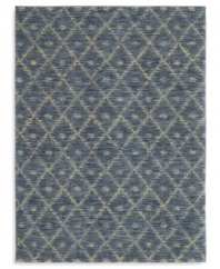 A subtle, hushed pattern of diamonds and dots against an exquisite indigo ground enhances any decor with soft-textured style. This statement-making rug from Karastan is woven from 100% premium worsted 2-ply wool for a soft hand and long-lasting wear.