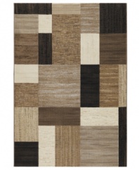 A myriad of variegated shapes in neutral hues collect upon this Taylor Geometrics rug, offering a truly unique an strikingly modern design. Crafted on a Wilton power loom of heat-set polypropylene for ultimate durability, no matter where it's placed.