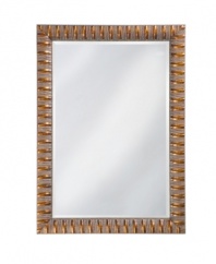 Rugged yet refined, Howard Elliot's Moore mirror frames contemporary decor in simply carved, antique-finished wood. A mottled copper hue adds subtle radiance for a look that's undeniably handsome.
