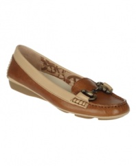 Preppy chic makes a comeback! The Arnie loafer from Etienne Aigner is a classic flat crafted from rich leather and a flex sole for long-day comfort. Topped with a charming metal accent for added appeal.