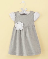 A flower for the little lady. Dainty floral details add girl power to this simple, stylish dress from First Impressions.