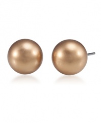 Treat yourself to a simple luxury. Rich stud earrings by Carolee feature shimmering gold glass pearls (12 mm) in a gold tone mixed metal post setting.