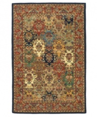 An eye-catching display of color and texture that finds its heritage in the rug-making techniques of ancient Persia. Tufted in India from pure wool, this Safavieh area rug is set in striking primaries with an all-over floral motif that adorns your floor with a visually stunning presence. (Clearance)