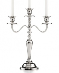 It's all about ambiance. Handcrafted in polished nickel plate, the Hampton candelabra from Leeber brings good old-fashioned grandeur to light.