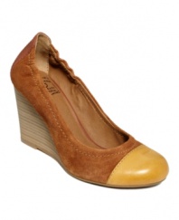 Down to earth. Rich, neutral hues lend a casual vibe to the funky Gabrielle wedges by Lucky Brand.