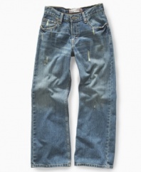 For the rough and rugged boy who loves his faded blues. In a boot-cut style washed and worn for a lived-in look, these Levi's Boys Husky jeans are sure to be his favorite.