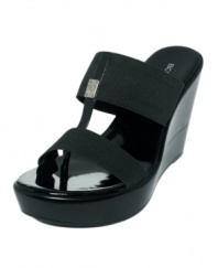 The BCBGeneration Quintin Wedges keep things simple and slick with their stretch straps, logo decor and shining wedge.