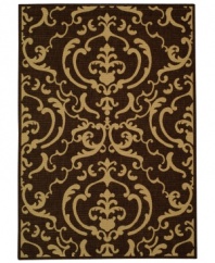 Safavieh takes classic beauty outside of the home with this elegant rug, created with a specially designed sisal weave. In deep chocolate brown and beige colorways, this beautiful piece makes the most of any outdoor patio, porch or balcony. (Clearance)