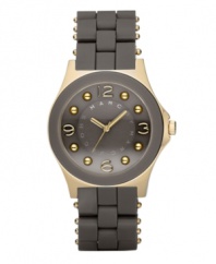 Rich as chocolate and perfectly on trend, by Marc Marc Jacobs. Vine silicone-wrapped stainless steel bracelet with gold ion-plated accents. Round gold ion-plated case with concave ring. Vine-colored dial features goldtone hands, logo, numerals at twelve, three, six and nine o'clock and gold ion-plated dot markers. Quartz movement. Water resistant to 30 meters. Two-year limited warranty.