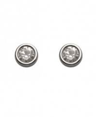 Add a little snap to your look when you slip on a pair of sparkling studs. Swarovski earrings feature a round-cut, bezel-set crystal set in silver tone mixed metal. Approximate diameter: 1/4 inch.