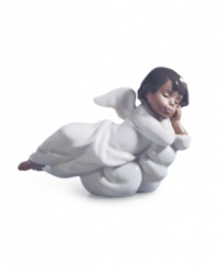 An angel from Lladro, the Heavenly Dreamer figurine watches over your family from a fluffy white cloud, in delicately handcrafted porcelain.