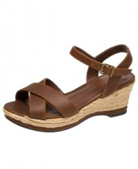 Raise the game. Style will be at a new level when she slips into these platform wedge sandals from Jessica Simpson.