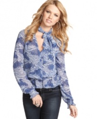 Nab ladylike style in this floral print top from Guess? that flaunts the season's hottest detail – a bow tie!