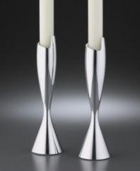 This dramatic candlestick pair adds contemporary flourish to the table. Crafted of Nambé metal alloy that has the heft and shine of solid silver but won't tarnish. Measures 7.