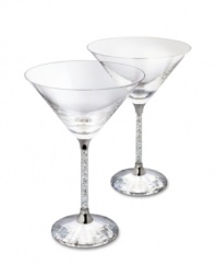 Add a touch of brilliant sparkle to your entertaining style with this set of cocktail glasses. Shown at front left. The bowls' classic lines and stems filled with glimmering Swarovski crystals combine for a sophisticated sensibility. Each measures 6 5/8 H x 4 7/8 D.