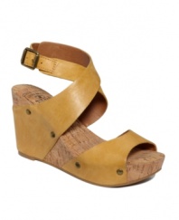 Down to earth. Lucky Brand's Moran wedge sandals put the hip in hippie-inspired style. With a supportive leather ankle strap and cork platform heel, they exemplify the brand's commitment to casual chic.