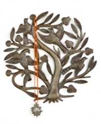 Keep necklaces and bracelets waiting in the wings with this elaborate jewelry tree. Graceful birds and branches sculpted from recycled scrap metal show the creativity of Haiti's master artisans.