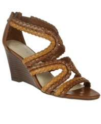 Break out of your shell this season. The Peanut sandal by Etienne Aigner shows off your breezy style with folksy braiding and a trendy, elevated wedge.