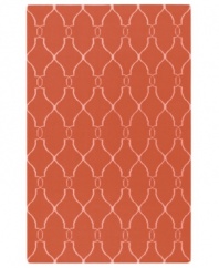 Stunning in its simplicity, this artist-designed area rug from Surya brings a calming beauty to any area in your home. Interlocking lines crisscross against a soft coral background, creating a chic lattice-like pattern that's stylishly simple.