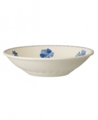 Vintage charm meets modern durability in this Farmhouse Touch soup or pasta bowl, featuring cornflower-blue florals and bands in delicately embossed porcelain from Villeroy & Boch.