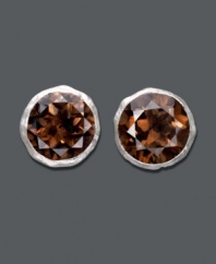 Stud earrings always add a classy, last-minute touch. Studio Silver's elegant style is no exception with its round-cut smokey topaz center (5-3/4 ct. t.w.) in polished sterling silver. Approximate diameter: 1/2 inch.