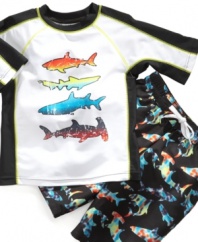 These swim shorts from Flapdoodles are a ferociously cool addition to his summer beach style.
