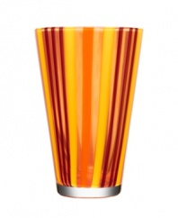 With a retro feel and stripes of fun candy colors, the beach-inspired Cabana vase brightens any space with irresistible style. Designed by Ludvig Lofgren for Kosta Boda.