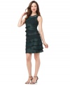 This chic cocktail dress from SL Fashions is sure to make a statement with a slinky shape and fluttering pleats!
