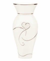 Adorned with loopy hearts in graceful ivory porcelain, the True Love vase from Lenox is beautiful gift for brides or romantic gesture for your sweetie. Qualifies for Rebate