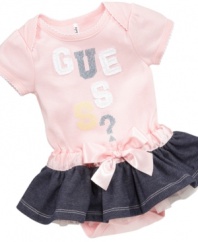 Come on baby, do the twist. She'll be ready to rock and roll no matter where she's at in this adorable romper from Guess.