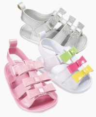 Bows for her toes will make her feet fancy in these soft-soled baby shoes from ABG Accessories.