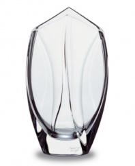This elegant vase is small and striking and takes its shape from the inspiring look of a flower bud. In substantial, carefully crafted handmade crystal from Baccarat, with subtle curving waves of thickness along the sides and a mouth that comes to two gentle points, this vase is simply exquisite.