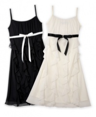 Black and white styling and corkscrew embellishments make this BCX dress totally sweet AND chic!