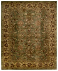 For the Jaipur collection Nourison uses a unique herbal wash to create the silky sheen and antique appearance of these fine wool rugs. In rich olive green with blooms and vines aplenty, the rug enhances your home with lavishly elegant style.
