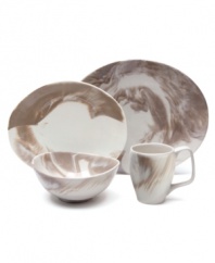 With soft, elegant curves in glazed porcelain, this Nambe dinnerware mimics the grace and beauty of a butterfly in flight. A marbled finish ensures no two pieces are the same, making each place setting an original work of art.