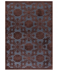 Lose yourself in the spellbinding look and unbelievably plush feel of Couristan's Pave Bezel Medallion rug. Woven of a luxe blend of viscose, silk and chenille for one-of-a-kind texture and high-low carved effect, the medallion-patterned rug is rendered in rich chestnut and lapis hues to add high style to any room.