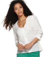 A chic button-front silhouette in light-as-air fabric makes this easy shirt from Calvin Klein Jeans an instant classic.