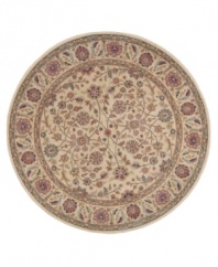 Inspired by the lyrical beauty of ancient Persian carpets, this round rug features a field of flowers entwined in a curvilinear design with a warm palette of pumpkin, mauve and moss green against a soft beige ground. Woven of premium Opulon(tm) yarns to create a lavish pile with a rich, color-enhancing finish.