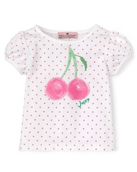 With a frilly ruffle surprise in back, this charming cherry print and polka dot tee from Juicy will up the adorable factor.