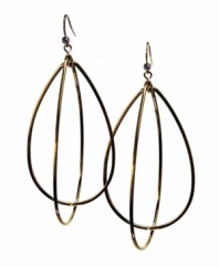 Turn heads with these unique and stunning goldtone mixed metal large teardrop hoop earrings by GUESS. Approximate drop: 3 inches.
