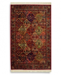 An intensely colored rug that recalls the graceful style and bold design of original Kirman rugs woven in ancient Persia. Comprised of 50 individually-dyed colors to create a stunning depth of texture and hue. A patented luster-wash imparts an elegant vintage look and feel. Woven in the USA of premium fully worsted New Zealand wool.