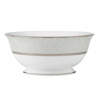 At once formal and festive, the Pearl Beads serving bowl sets a celebratory tone in fine bone china wrapped in bands of shimmering platinum. Swirling white dots adds a sense of playfulness to an elegant Lenox dinnerware collection. Qualifies for Rebate