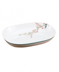 Make every meal sing with the bright watercolor-inspired birds and florals that adorn this Chirp serving bowl. Built for lasting luster and strength in dishwasher- and microwave-safe bone china from Lenox Simply Fine. Qualifies for Rebate
